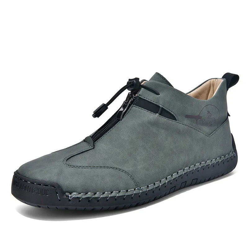 Men's black casual leather shoes with a mid heel and round toe on a rubber sole