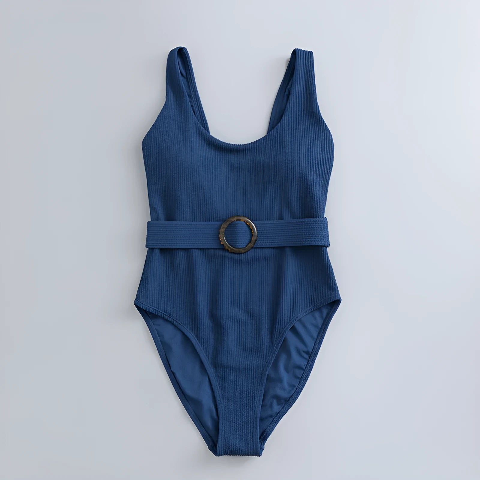Navy blue women's one-piece swimsuit with triangular chest shape and integrated chest pads