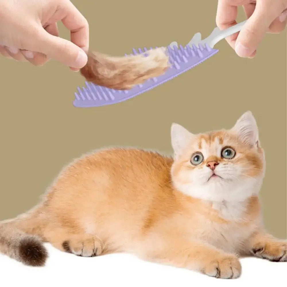 Fishbone-shaped cat brush for indoor pets, available in blue, gray, and purple colours