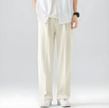 Men's loose straight ice silk casual pants in black, washed finish, side view