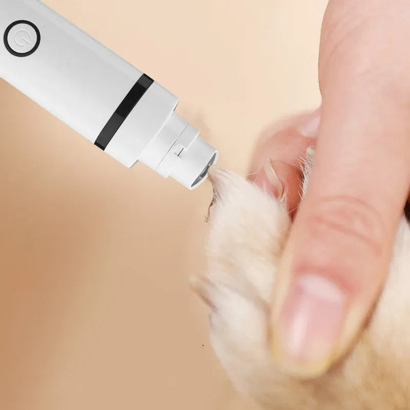 White pet shaving device for dogs with stainless steel blade, USB cable, three cutter heads, cleaning brush and oil