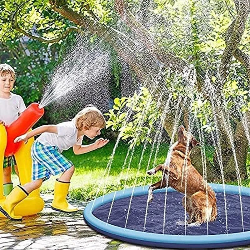 Large inflatable anti-slip dog sprinkler mat splash pad with water jets spraying, shown in a garden.