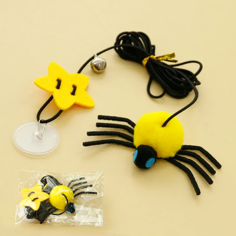Red and yellow cat hanging door toy with elastic rope, feather stick, bell, and spider attachment.
