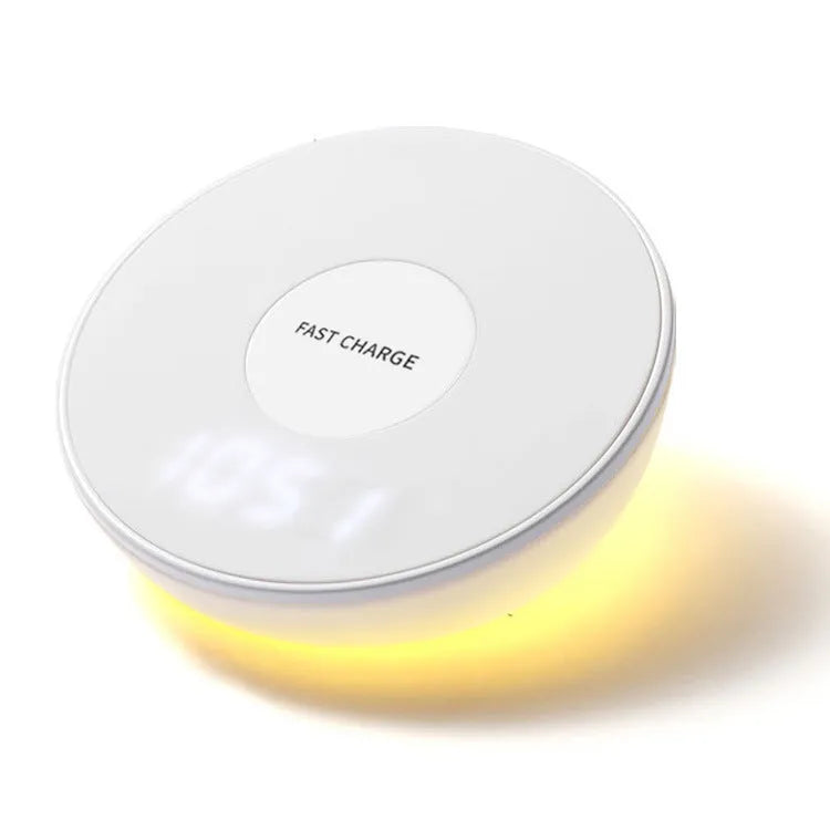 White wireless charging pad with digital clock display and control buttons for QI smartphone charging