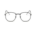 Retro street sunglasses with gold frame and transparent blue resin lenses