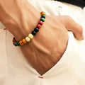 Natural lava stone bead bracelet for men and women on a wrist, showing ethnic style and essential oil application.