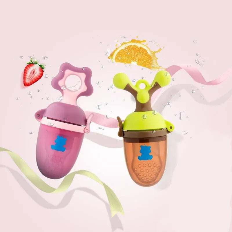 Green and purple baby bite trainers with textured surfaces and easy-grip handles