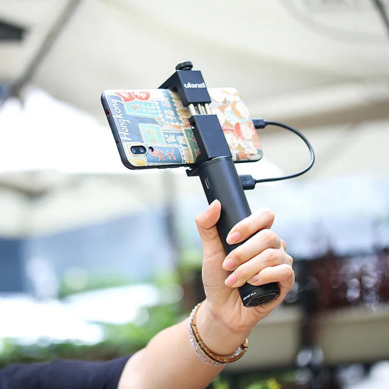 Black aluminium alloy power bank with carry handle showing 6800mAh capacity.
