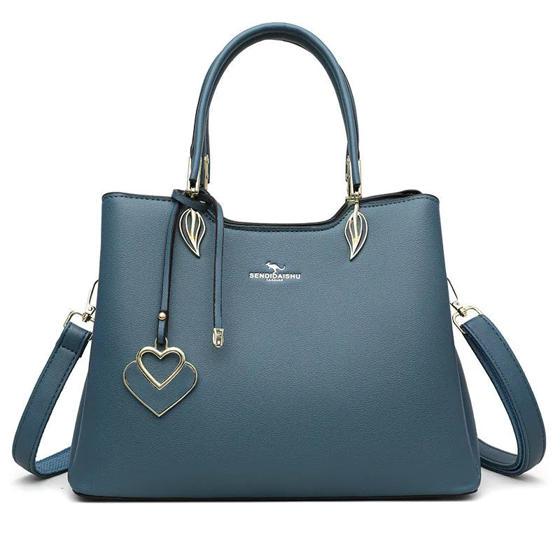 Women's black PU leather messenger bag with multi-layer shoulder design and sewing thread detailing