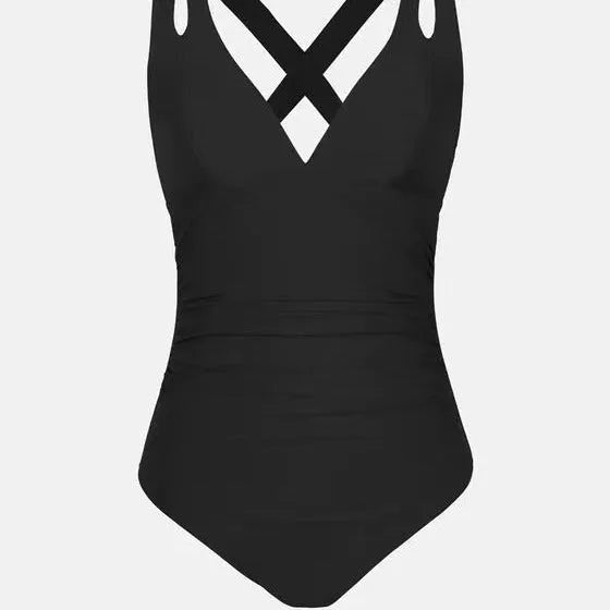 Women's solid colour one-piece swimsuit with triangle top and cross shoulder straps.