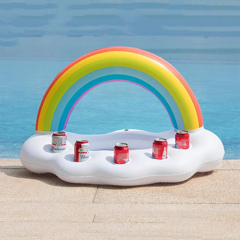 Rainbow inflatable pool float cooler with cloud shape and four glass holders floating on blue water