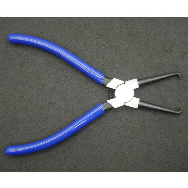Automotive caliper tubing pliers with iron construction and rubber grips for fuel line maintenance