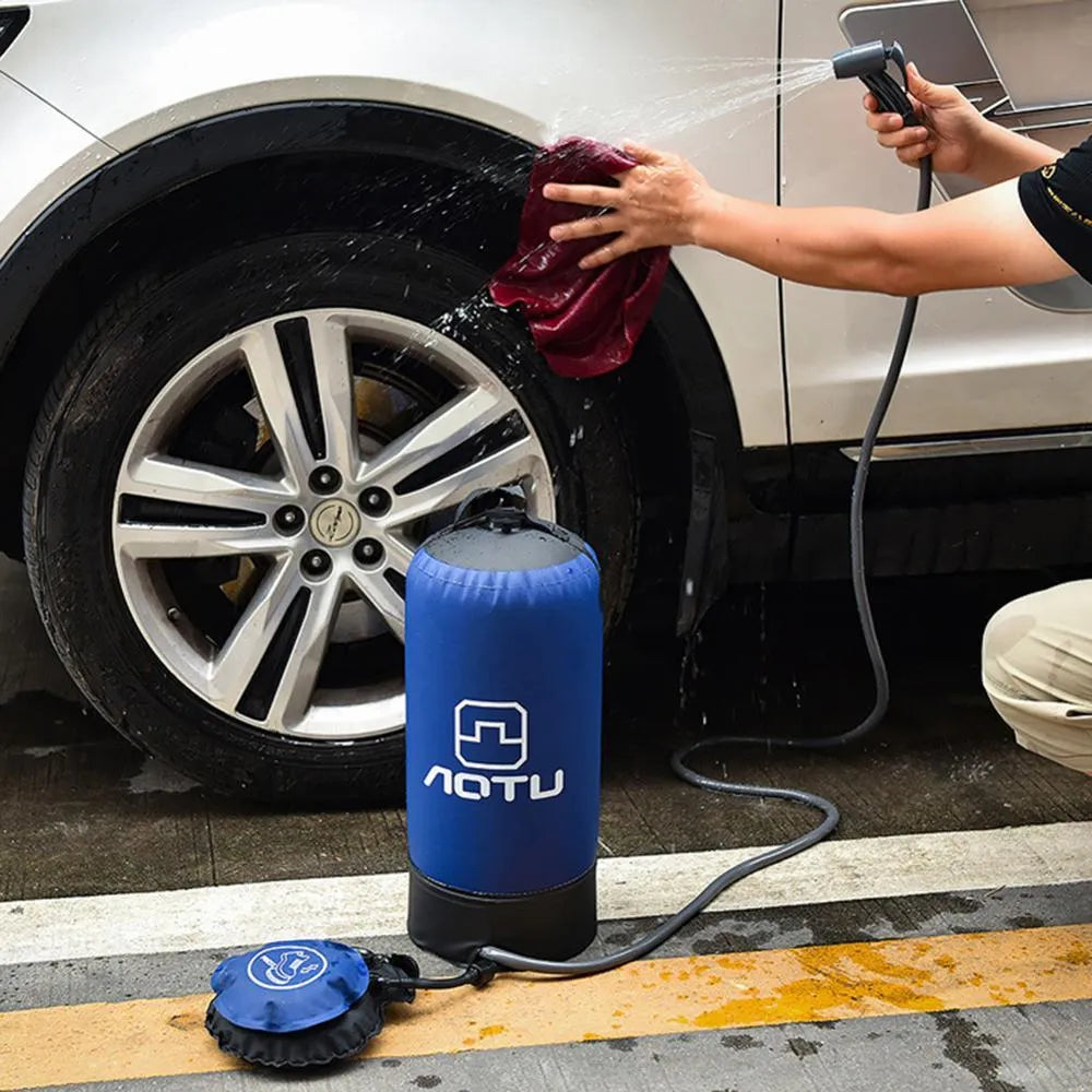 Blue portable outdoor shower bag with 11L capacity, foot pump, and 200cm hose