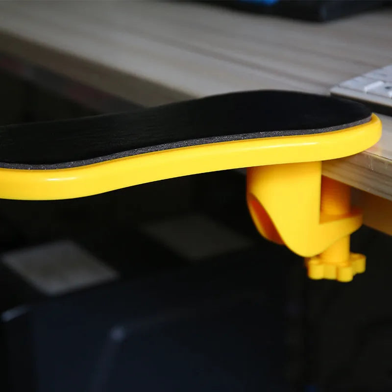 Ergonomic computer hand bracket mouse wrist pad in black leather finish with non-slip rubber base on a desk