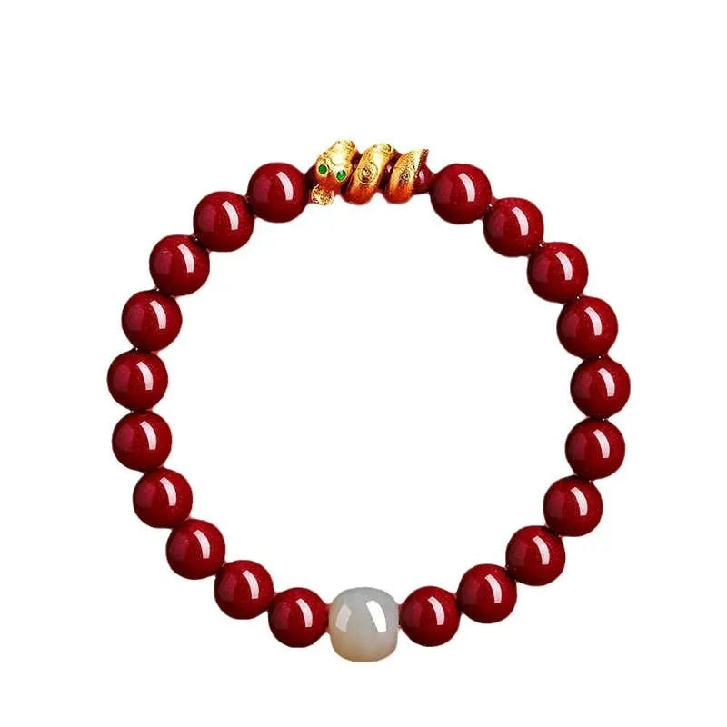 Handmade cinnabar Snake Year bracelet with Chinese zodiac design and roll snake beads.
