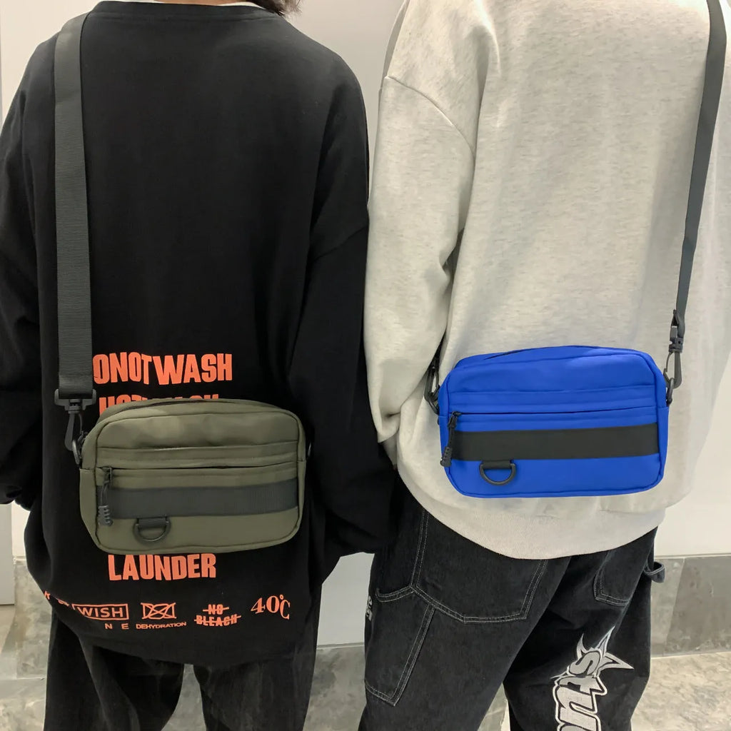 Men's nylon crossbody messenger bag in solid colour with visible sewing thread detail