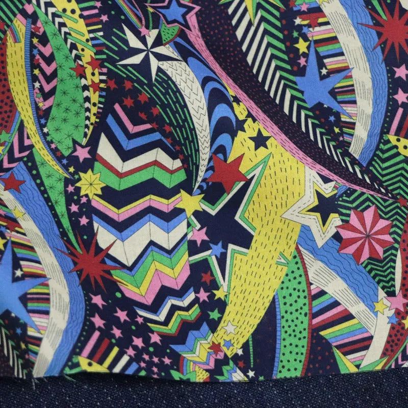 Blue floral digital print on 100% cotton fabric showing a 145cm wide by 1m long piece.