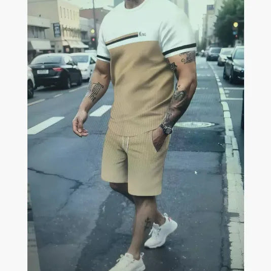 Men's loose fit polyester short-sleeved T-shirt and shorts suit for summer, shown in one of eight available colours.