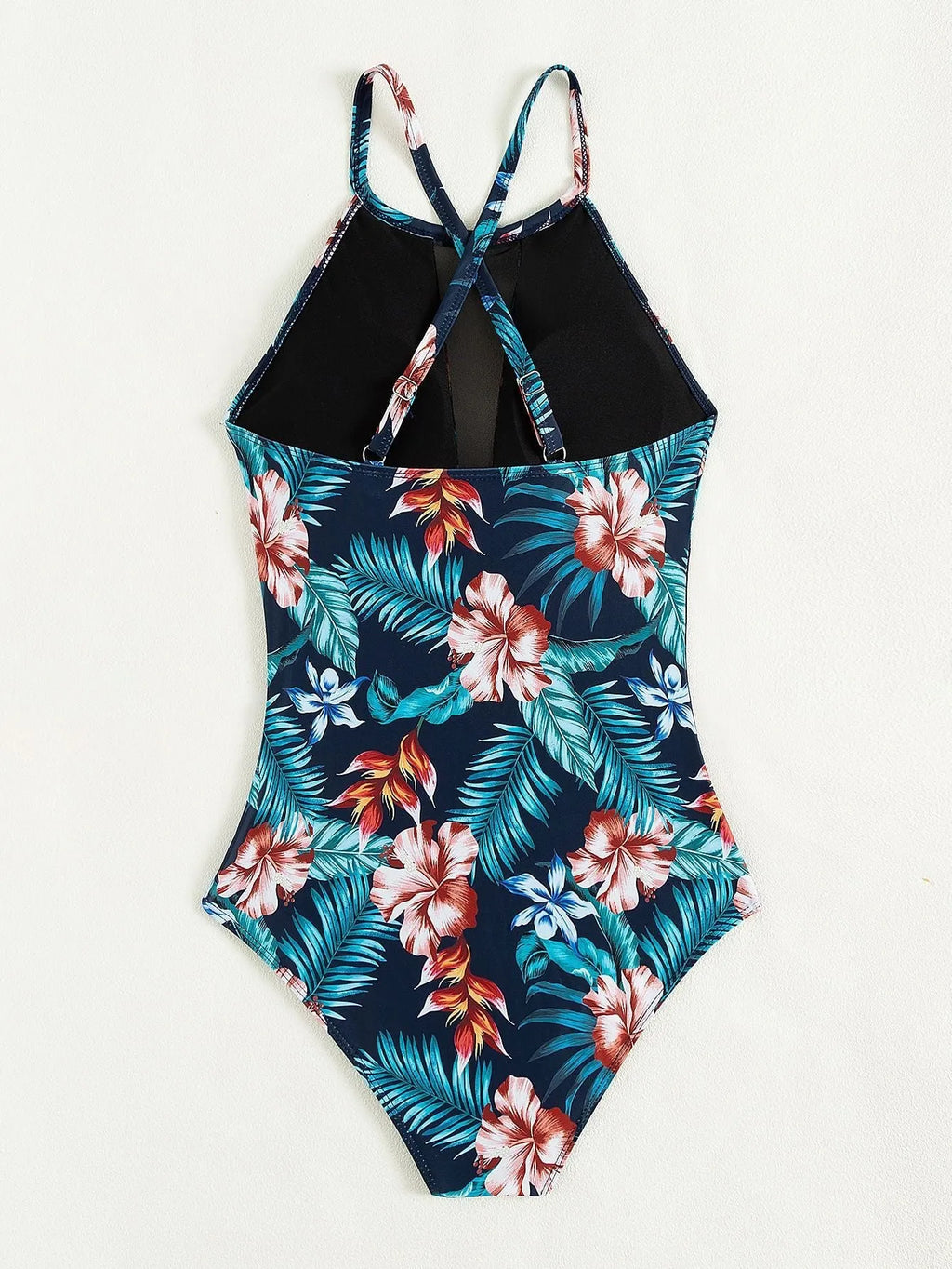 Women's deep V-neck one-piece swimsuit in a solid colour or gradient pattern.