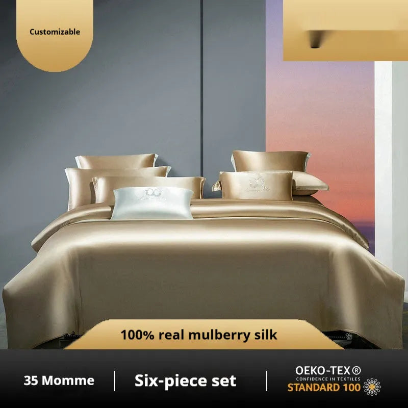 Solid colour silk quilt cover set on a bed, showing duvet cover and pillowcases in a champagne gold hue.