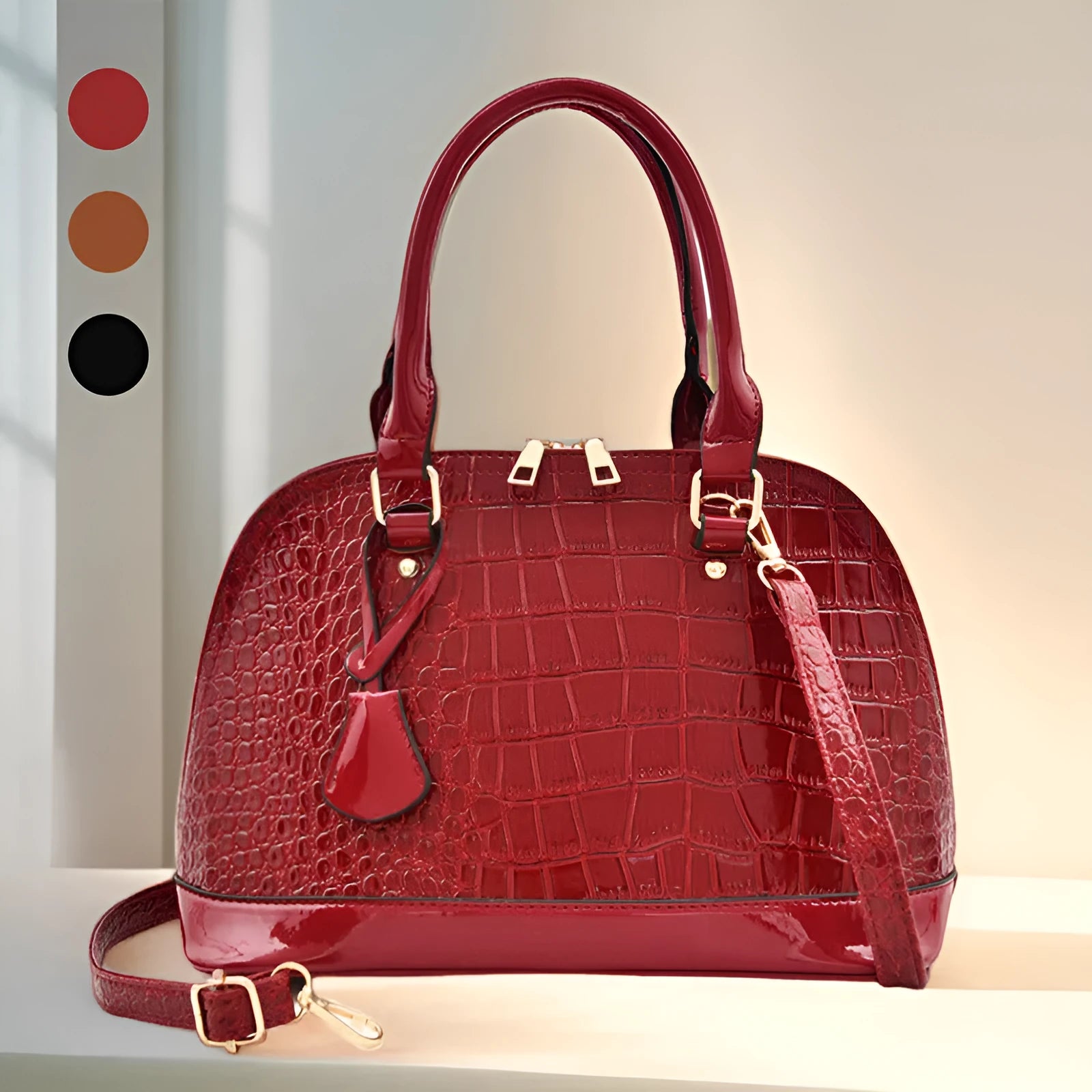 Large shiny black PU leather crossbody bag with structured shell shape design.