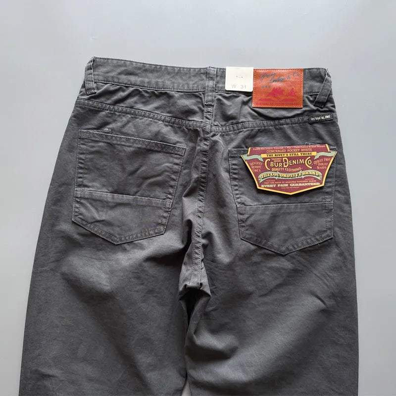 Men's straight leg cotton casual trousers in grey, army green, or khaki colour on a mid waist.