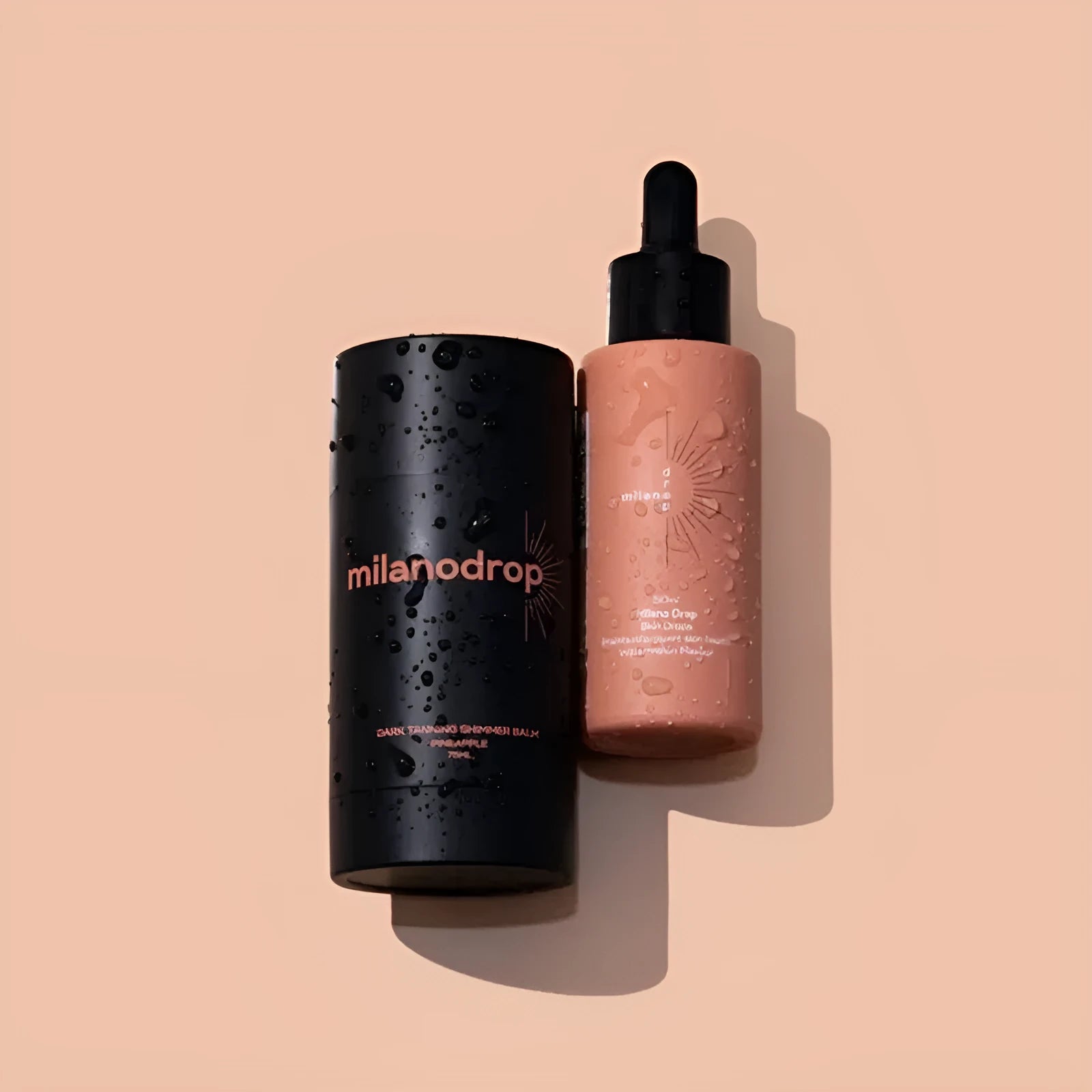 Matte black self-tanning liquid kit showing 50ml tanning drops bottle and 75ml tanning flash cream tube.