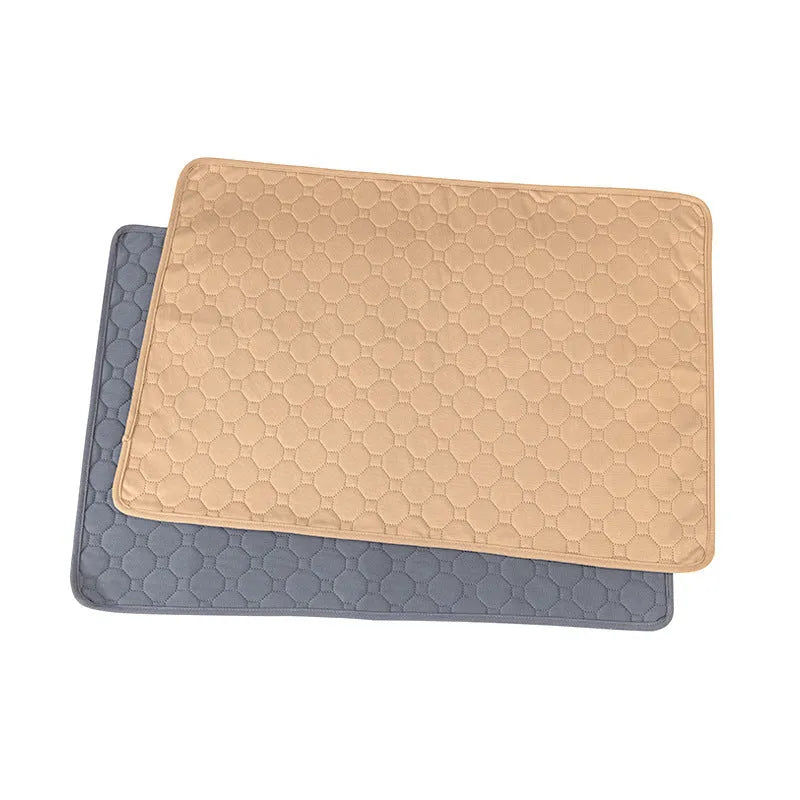 Grey and tan washable dog pee pads measuring 18x24 inches with triple-stitch binding