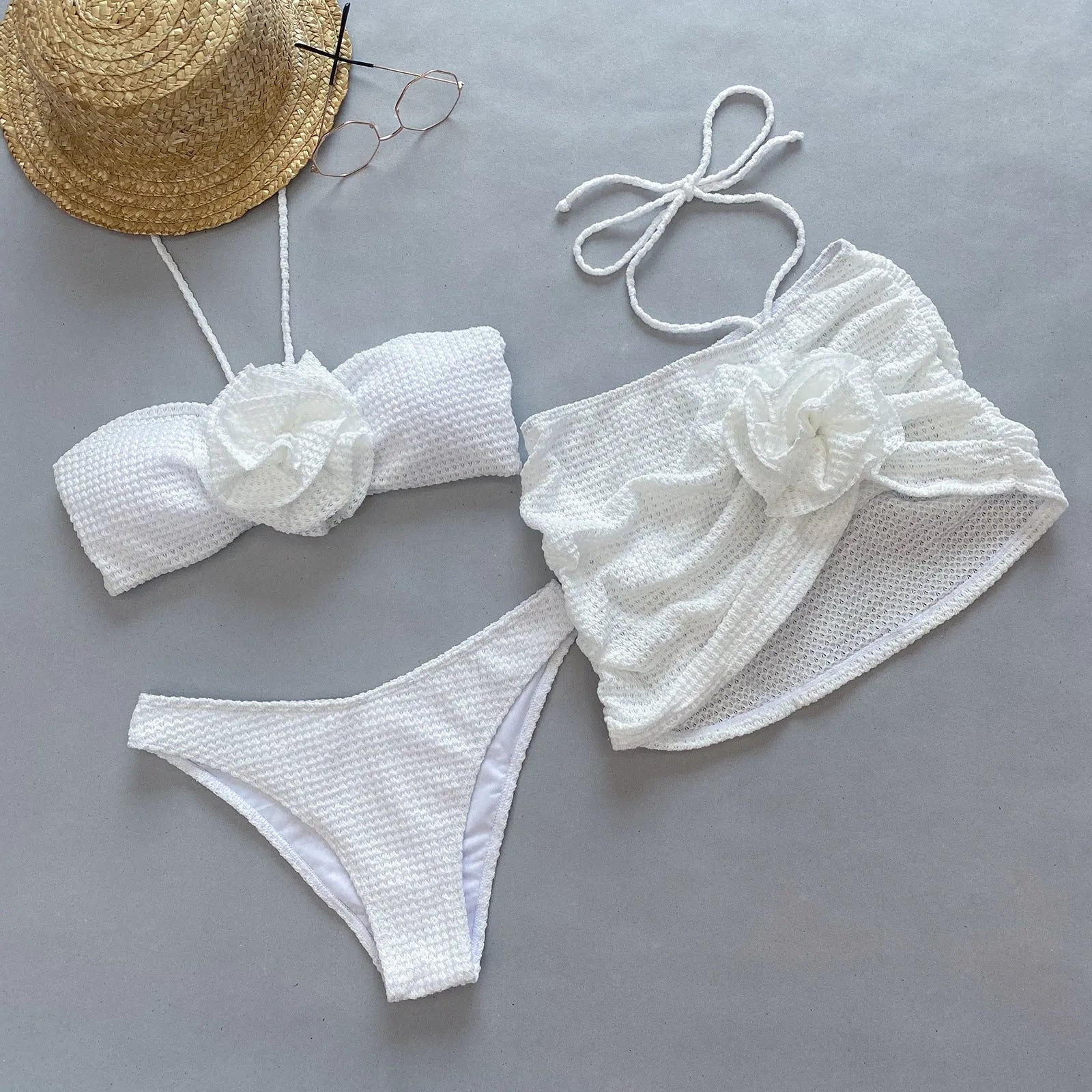 Women's three-piece bikini set with 3D flower split design in solid colour nylon fabric