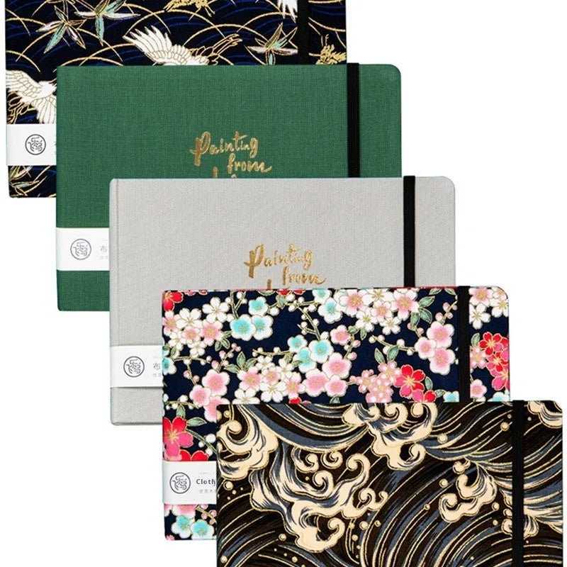 Feiluniao fabric watercolour notebook showing floral and animal cover designs in 185mm length
