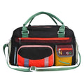 Large black oxford cloth sports messenger shoulder bag showing its spacious main compartment.