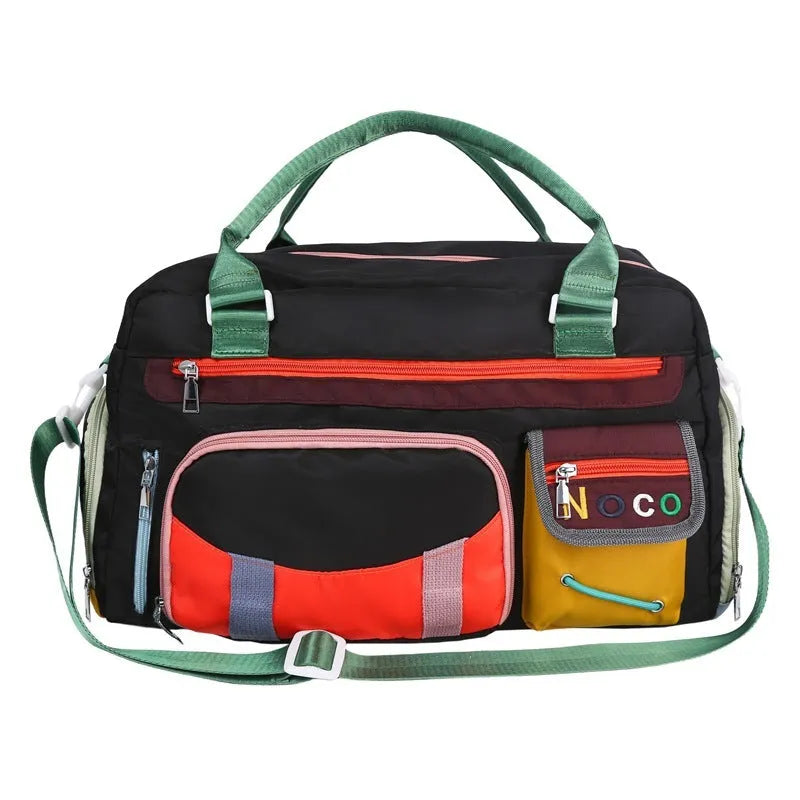 Large black oxford cloth sports messenger shoulder bag showing its spacious main compartment.