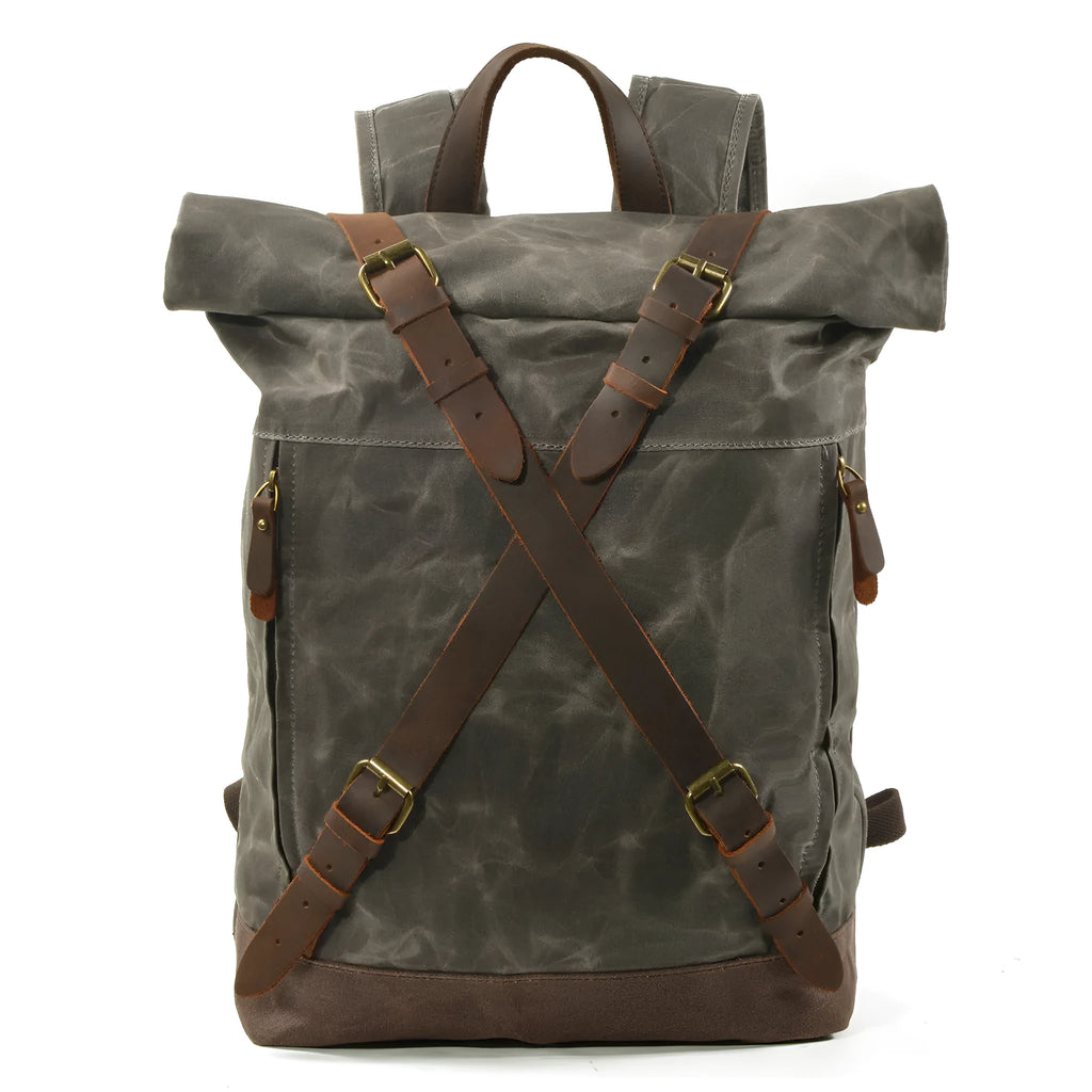 Waterproof canvas rucksack with linen lining, 20-35L capacity, softback design, shown in black, coffee, or celadon colour options.