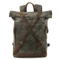 Waterproof canvas rucksack with linen lining, 20-35L capacity, softback design, shown in black, coffee, or celadon colour options.