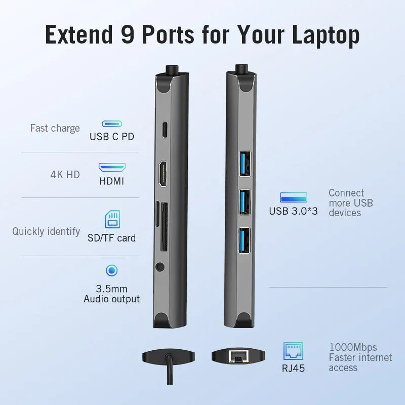 Deep grey aluminium USB-C multi-port hub showing HDMI, USB, Ethernet, and memory card ports on a desk