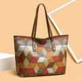 Women's large capacity PVC handbag in blue brown colour with outer sandwich pocket organisation