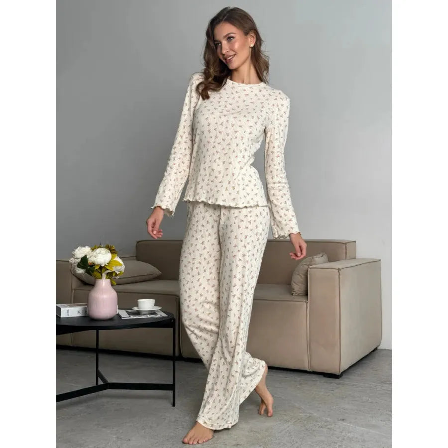 Women's white floral print lounge suit with bell sleeve top and wide-leg trousers