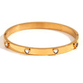 Stainless steel women's bracelet with micro-inlaid peach heart design in golden electroplated finish