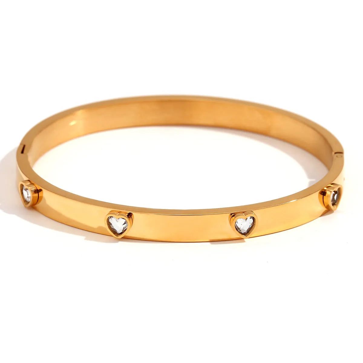 Stainless steel women's bracelet with micro-inlaid peach heart design in golden electroplated finish