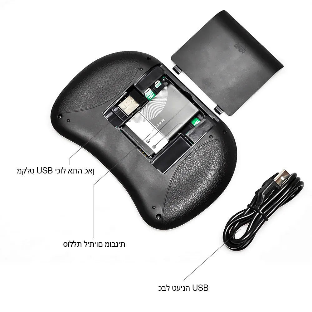 Backlit I8 mini wireless keyboard with touchpad in use on a table with smart TV in background