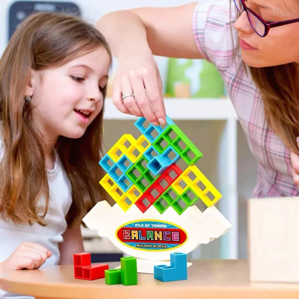 Plastic balance stacking tower game with coloured blocks on a base for kids and adults