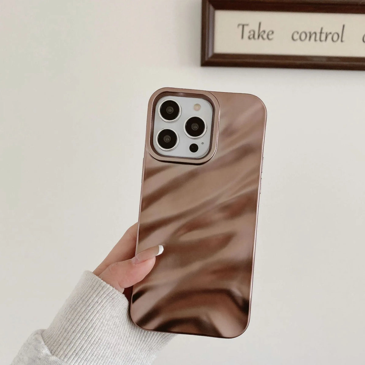 Soft solid colour wave pleated TPU protective case for Apple iPhone 17 series in burgundy on a white background.