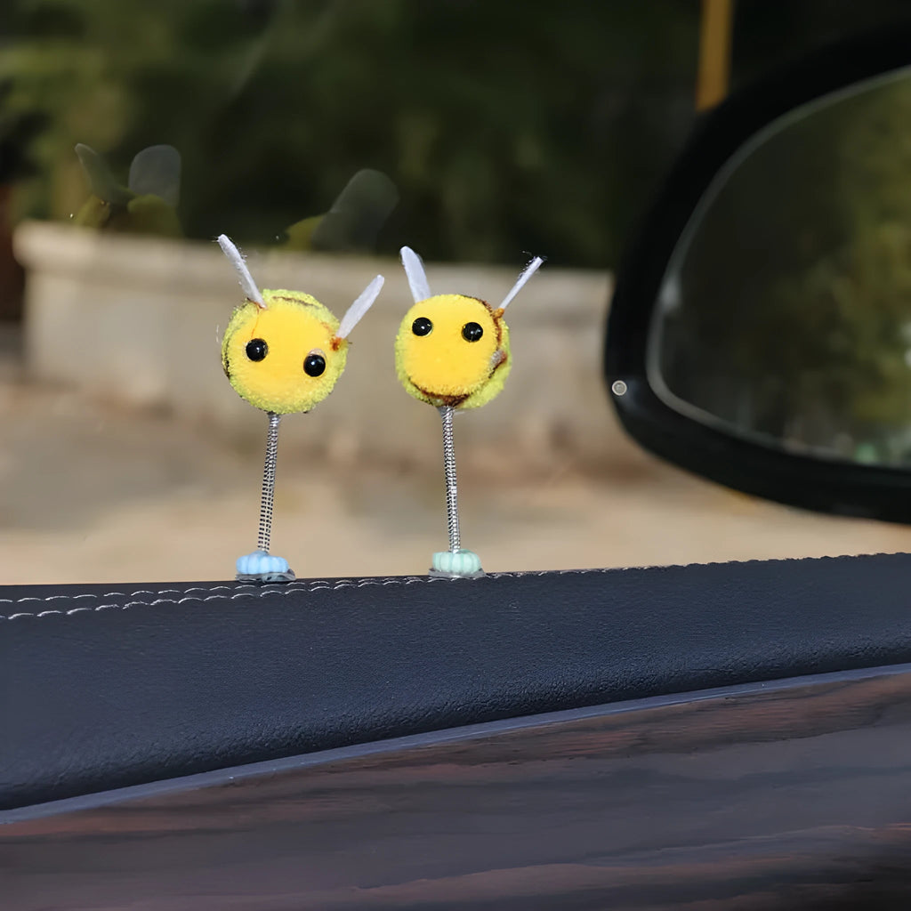 Swing spring bee car decoration made from soft fur ball material measuring 3x3cm