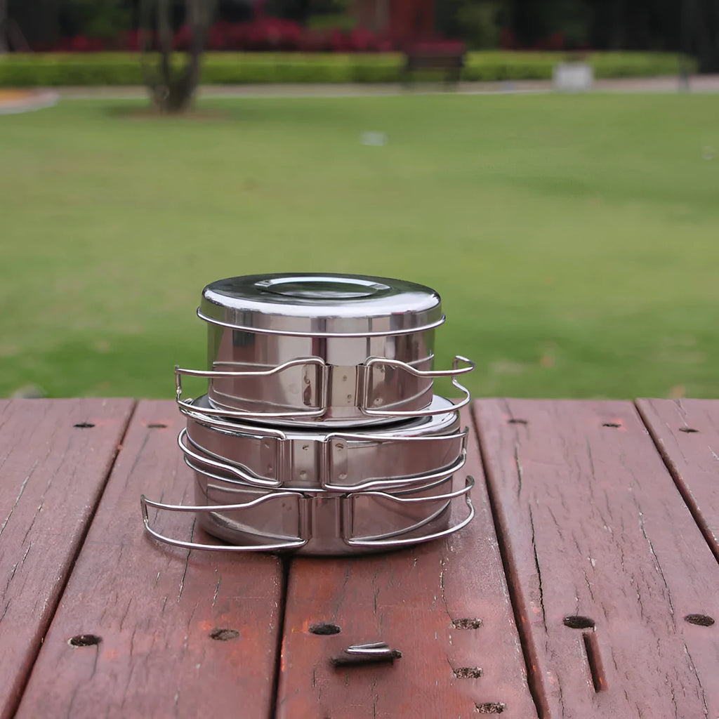Silver stainless steel round camping cookware set with four pieces for outdoor use