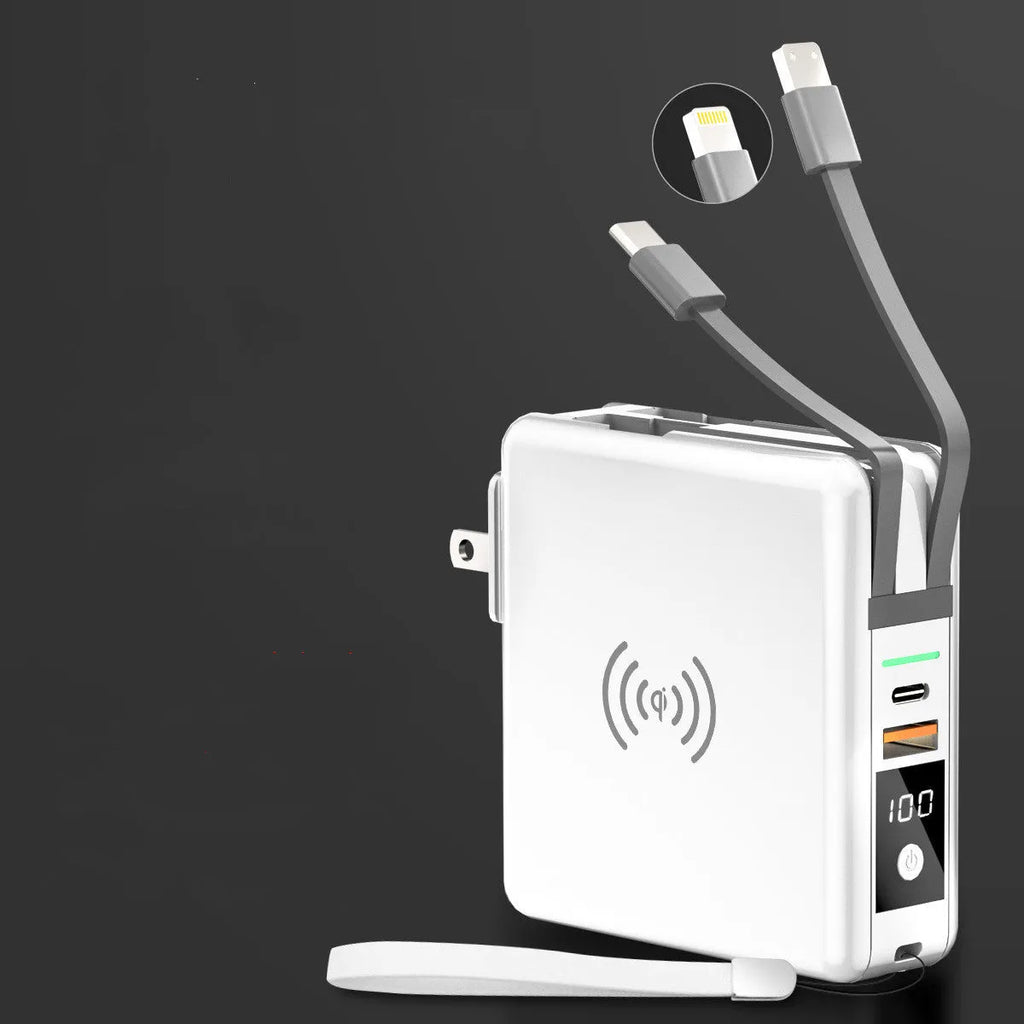 Black and white wireless charging power bank with folding UK plug and international travel adapters