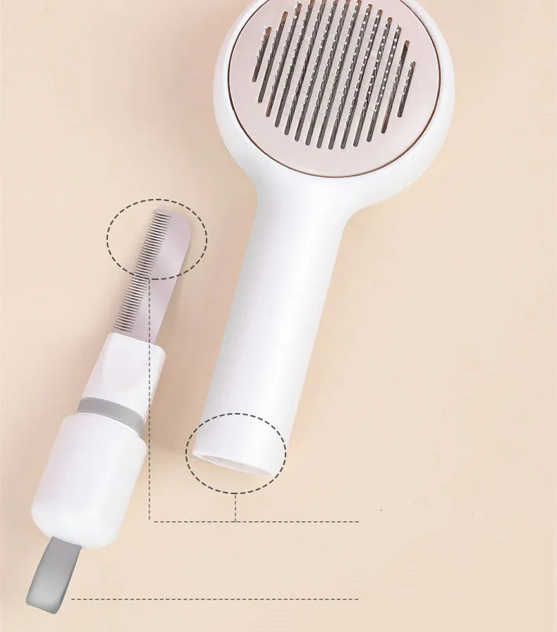 Pink cat combing brush floating needle comb for cats and dogs on white background