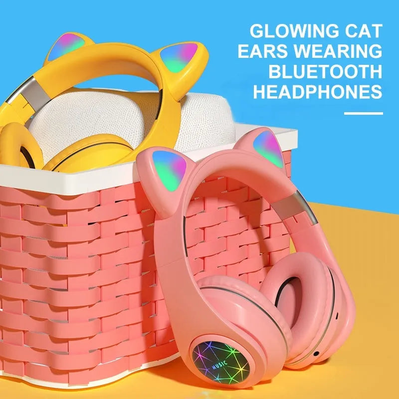 Cat ear style wireless Bluetooth sports headset shown in multiple colour options including pink, blue, and black.