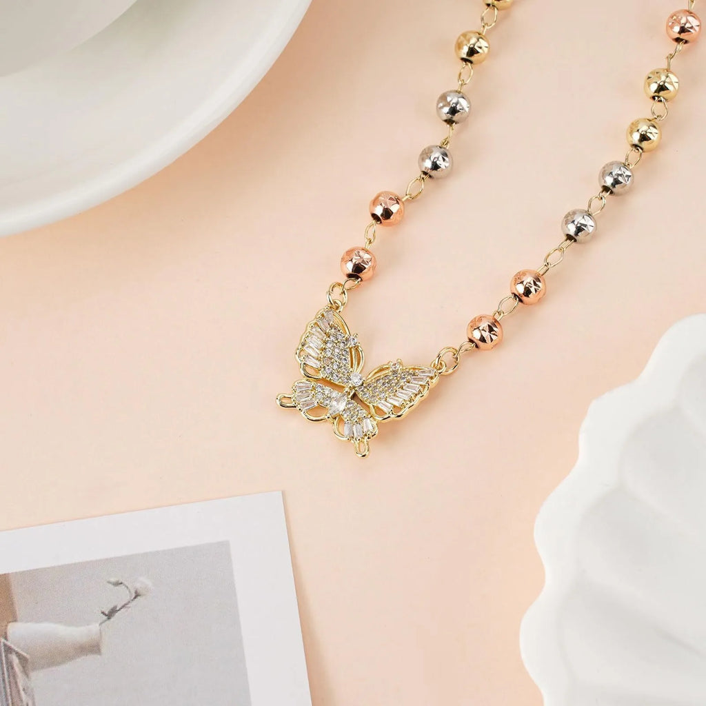 Gold butterfly pendant necklace with zircon inlay, adjustable stainless steel chain, simple style for women