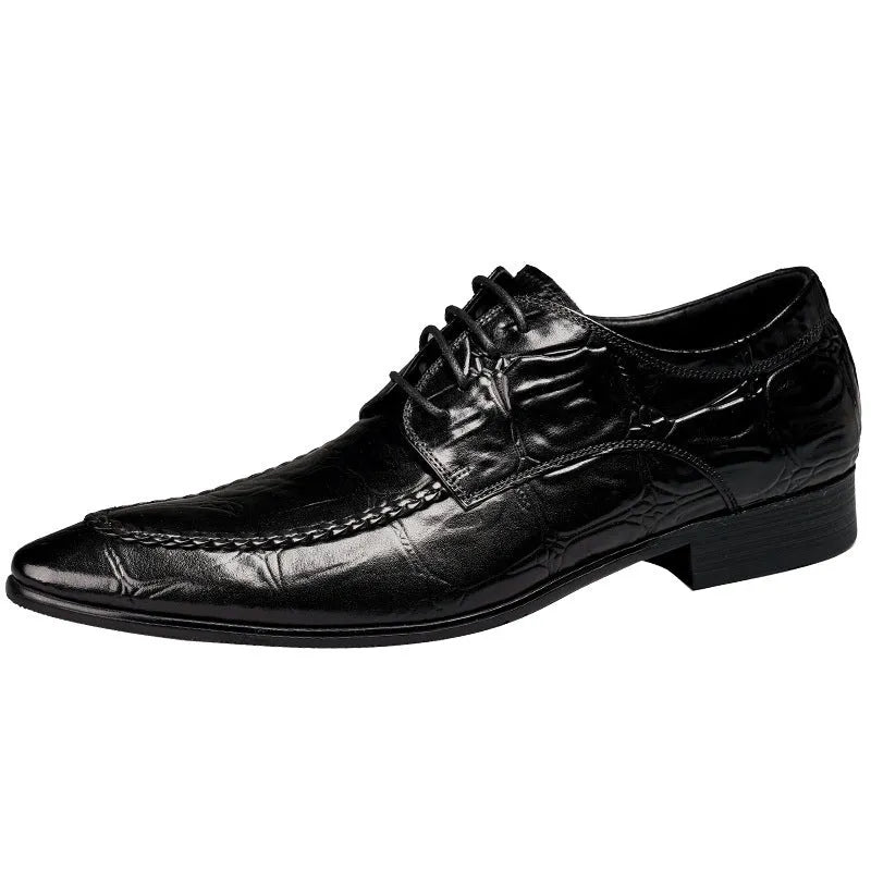 Men's black leather shoes with alligator pattern texture and a silver horse bit buckle on the front.