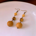 Resin fruit core tassel earrings in brown geometric round shape ethnic style for women